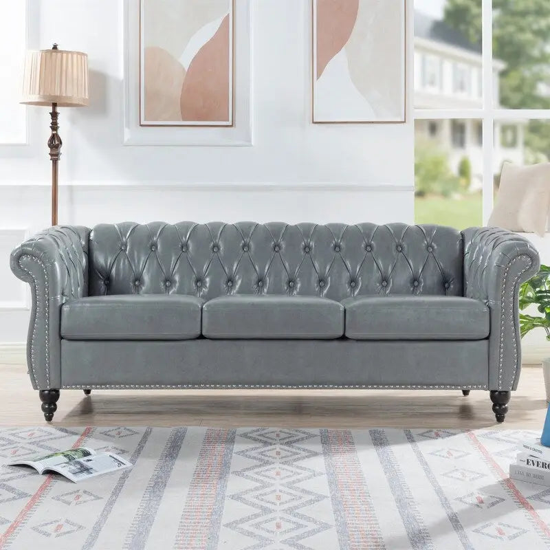 Canapé 3 places Chesterfield de 215 cm avec accoudoirs arrondis, capitonnage et clous décoratifs