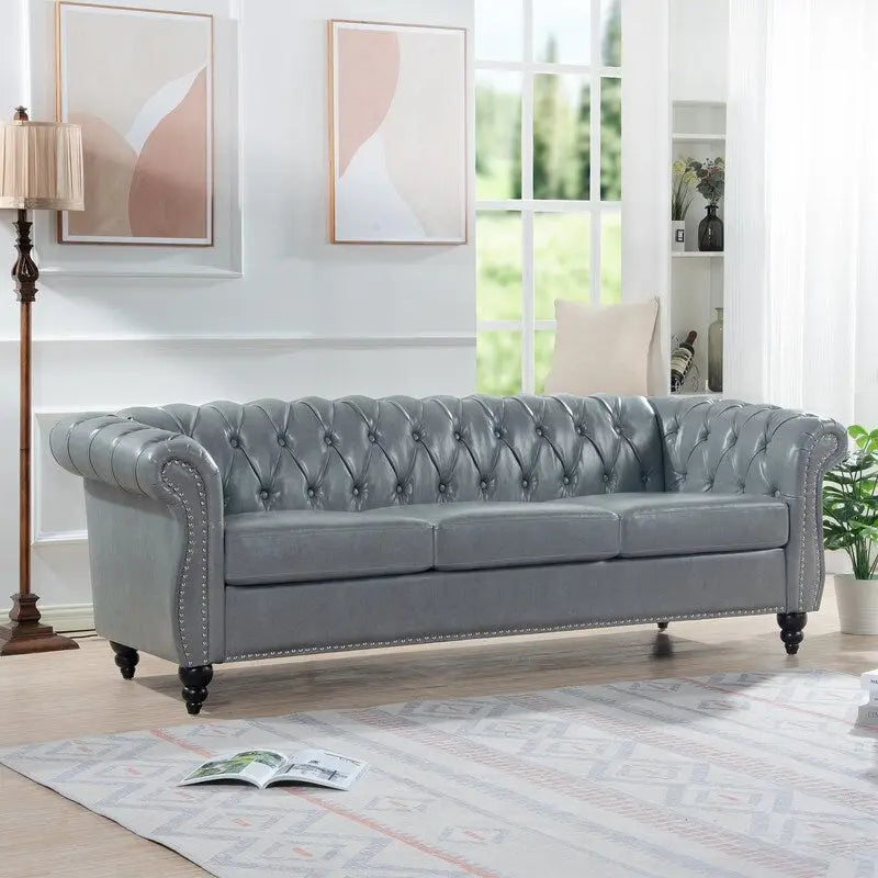 Canapé 3 places Chesterfield de 215 cm avec accoudoirs arrondis, capitonnage et clous décoratifs