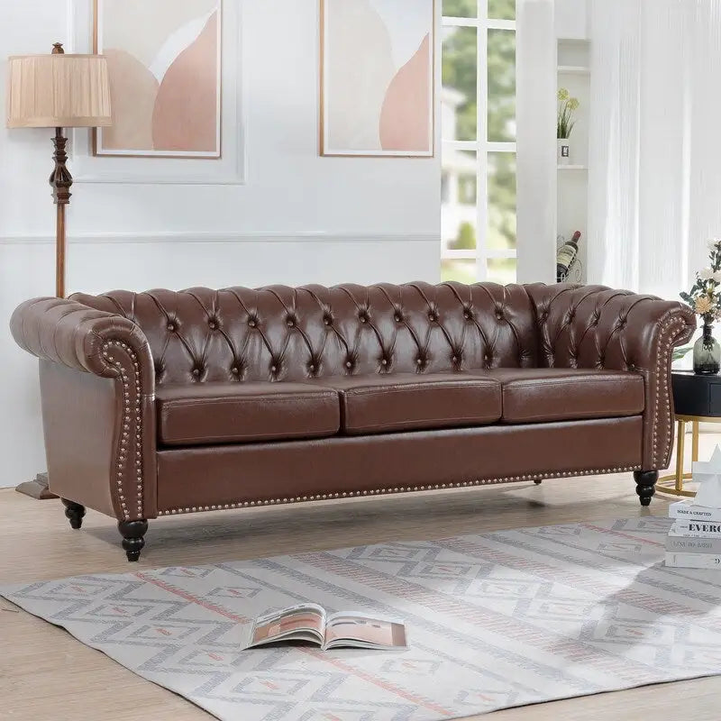 Canapé 3 places Chesterfield de 215 cm avec accoudoirs arrondis, capitonnage et clous décoratifs