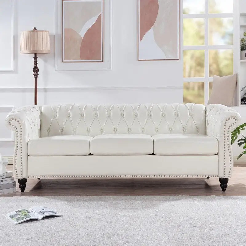 Canapé 3 places Chesterfield de 215 cm avec accoudoirs arrondis, capitonnage et clous décoratifs