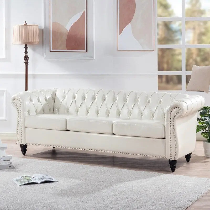 Canapé 3 places Chesterfield de 215 cm avec accoudoirs arrondis, capitonnage et clous décoratifs