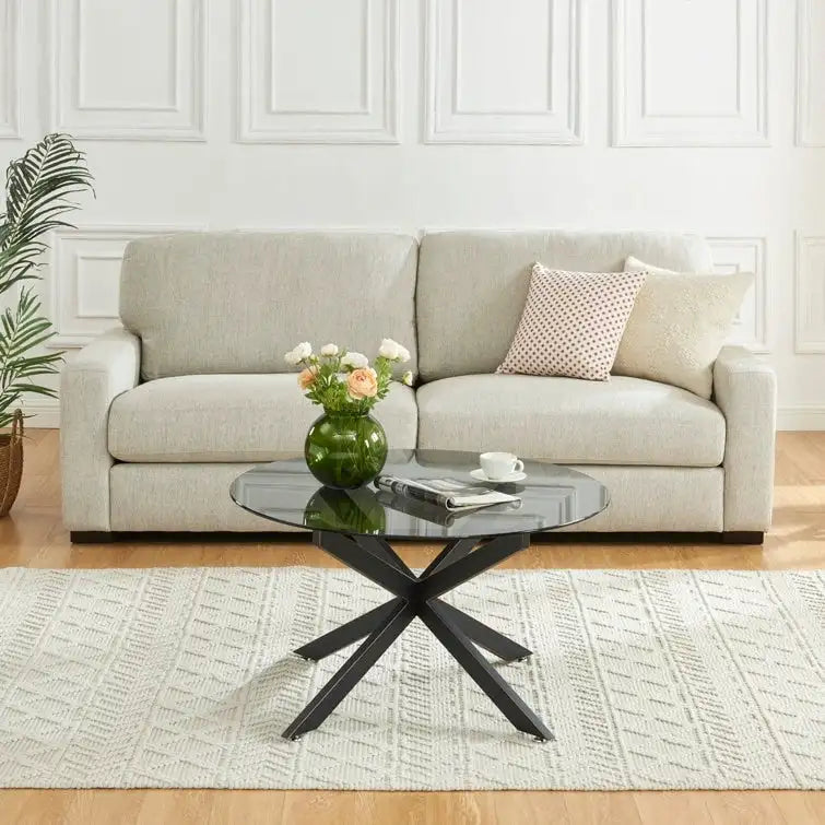 Table basse ronde en verre trempé avec pieds tubulaires en métal