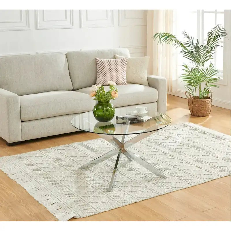 Table basse ronde en verre trempé avec pieds tubulaires en métal