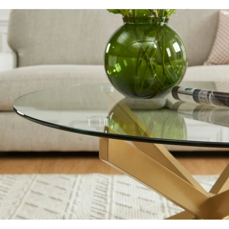 Table basse ronde en verre trempé avec pieds tubulaires en métal