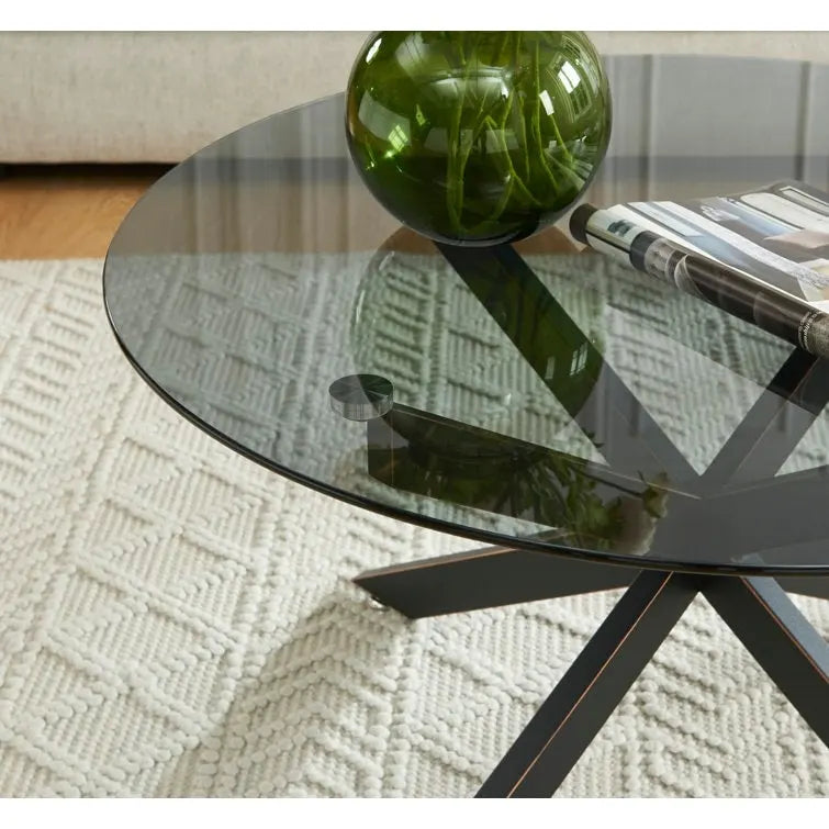 Table basse ronde en verre trempé avec pieds tubulaires en métal